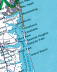 A close-up of a vintage nautical chart or map showing shoreline labels such as Point Pleas, Bay Head, Mantoloking, Shore Acres, Chadwick, Lavalle, Holiv, Barnegat, Island Beach, and other coastal place names over blue water and land areas.