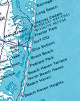 A close-up printed map showing coastal place names such as Barnegat, Long Beach, Surf City, Ship Bottom, and Beach Haven Heights over a light blue water area with white land and black road lines.