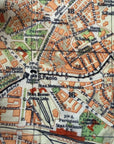 Close-up of a vintage map with labeled streets and landmarks