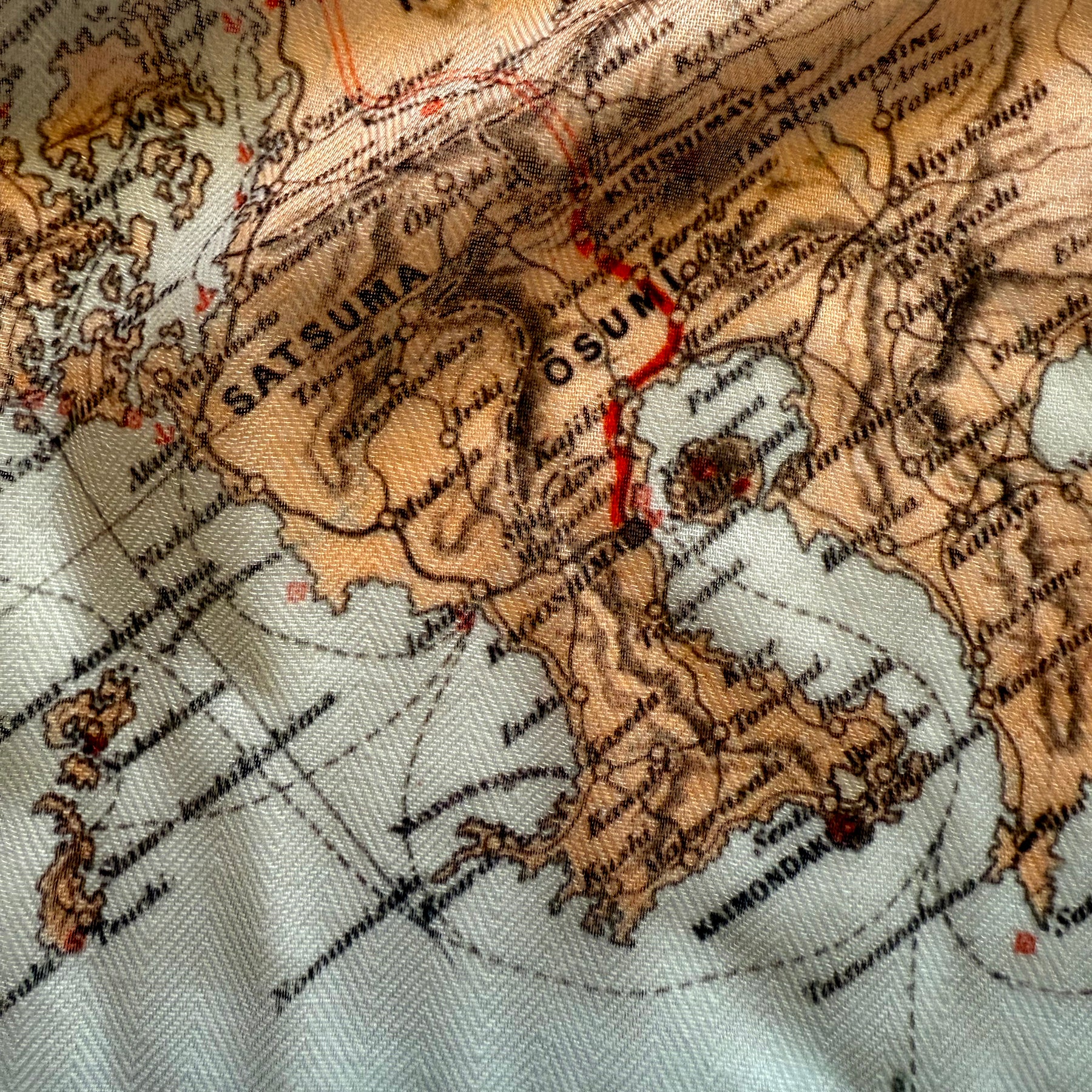 Close-up of an old map showing a region labeled 'Satsuma' and 'Osumi'.