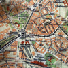 Close-up of a vintage map with labeled streets and landmarks