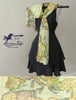 Black dress with a map-patterned scarf draped over a gray background, featuring the 'Maritime Tribes' brand.