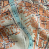 Close-up of an old map with streets and buildings labeled